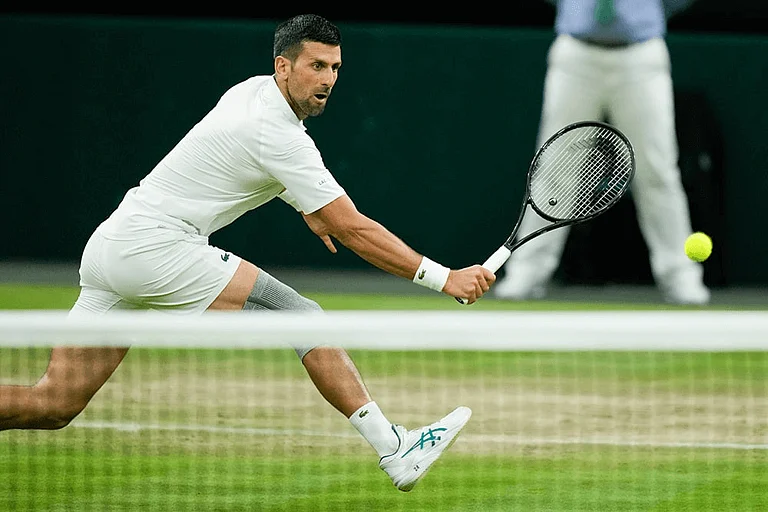 Novak Djokovic plays a return shot against Rune - Photo: Mosa'ab Elshamy
